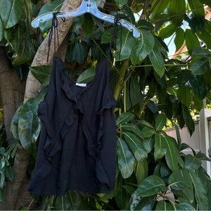 NWT Free people black tank with straps that tie silky material and ruffles